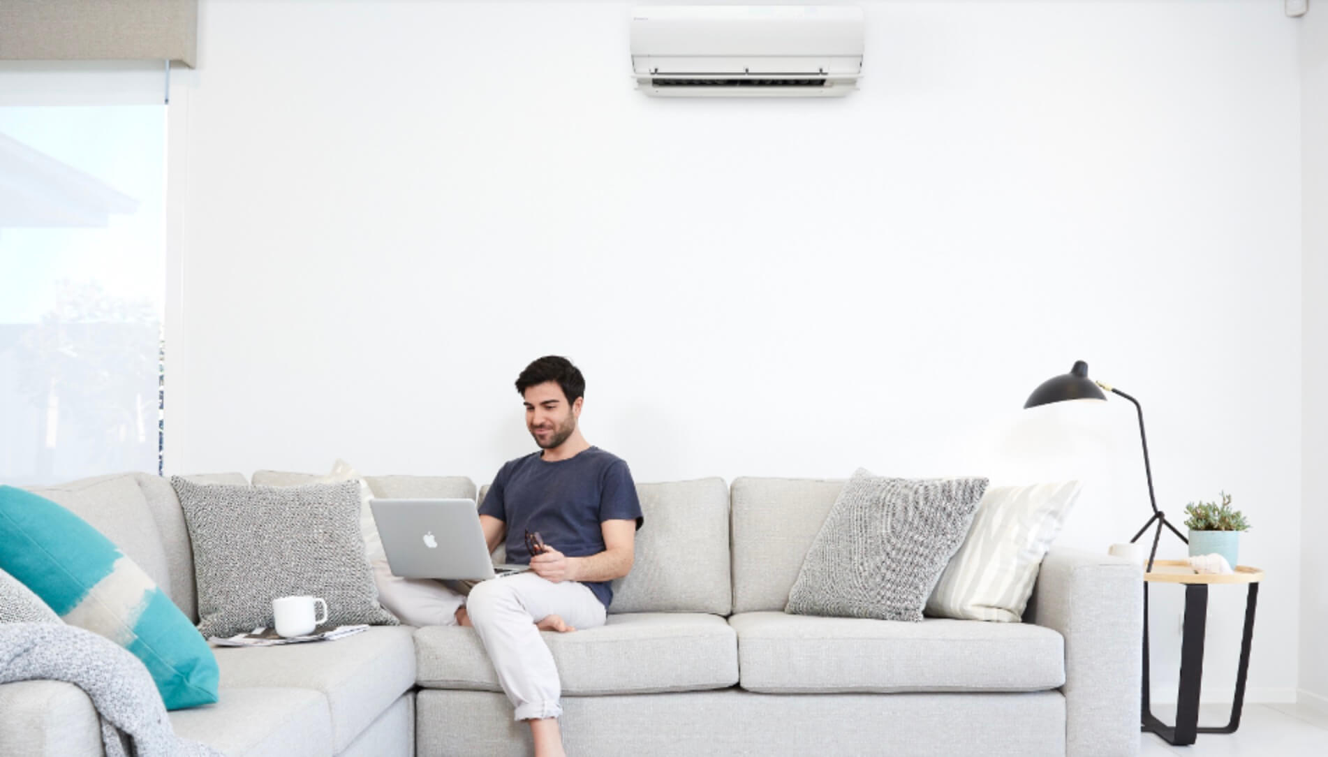 A Daikin airconditioning unit on display in a home.