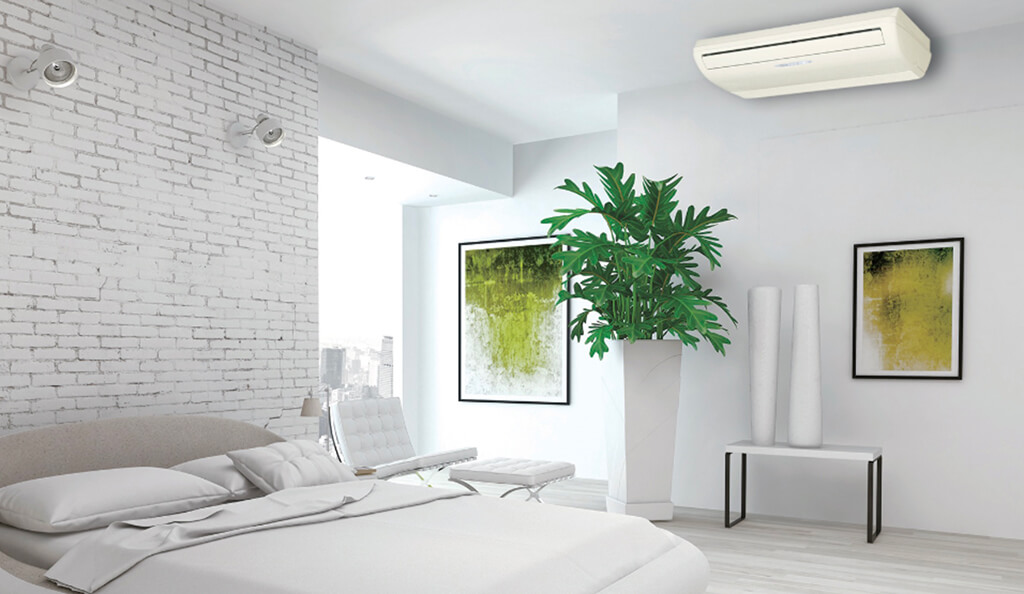 A multiple split system airconditioning unit on display in a full white apartment setting.