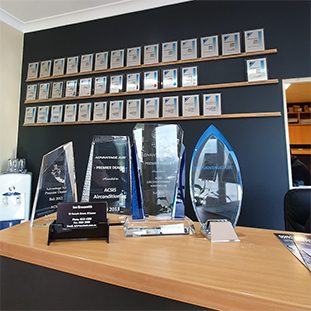 Awards and memorabilia achieved by acsis airconditioning warehouse.