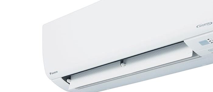 A wall mounted Daikin air conditioner.