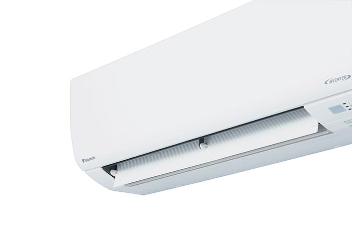 A wall mounted Daikin air conditioner.