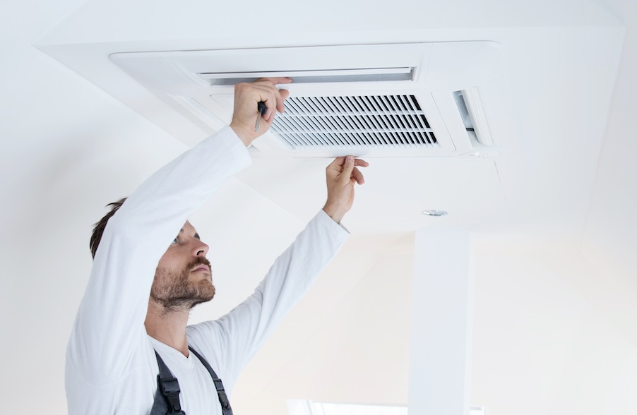 ceiling-cassette-air A ceiling cassette airconditioning system being installed.