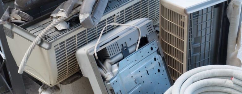 Pile of disposed air conditioning and HVAC units.