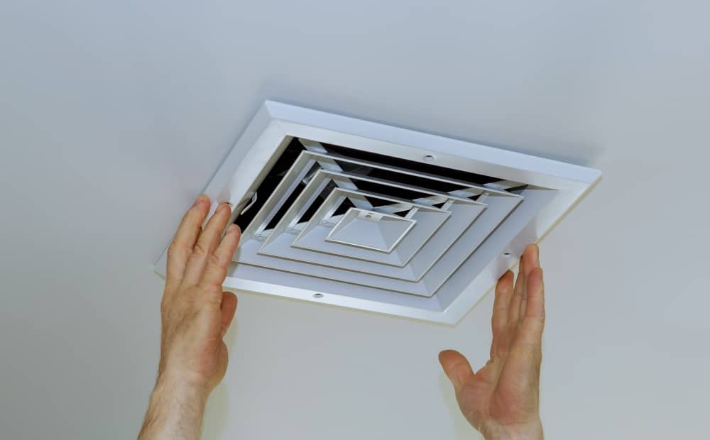 Once the unit is turned off, you can unscrew the vent cover.